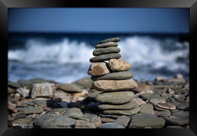 A  cairn pebble tower. Framed Print by Chris North