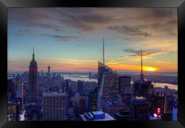 Sunset over New York Framed Print by Christopher Stores
