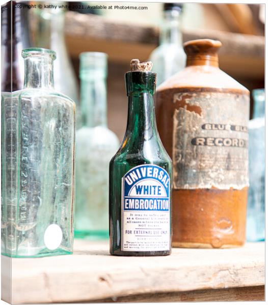 Old Bottles Canvas Print by kathy white