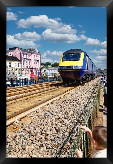 Thundering Train in Dawlish Framed Print by Roger Mechan