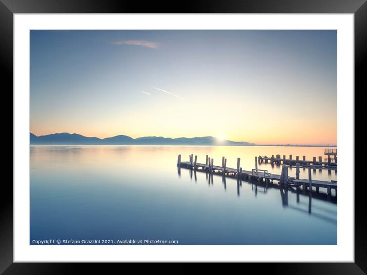 Three Wooden piers at sunrise. Torre del Lago Puccini. Framed Mounted Print by Stefano Orazzini