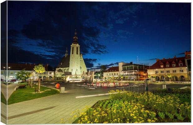 Limanowa, Poland : Panorama City center main square night view with a famous church and building cityscape a unit of local government powiat in Lesser Poland Voivodeship, southern Polish town Canvas Print by Arpan Bhatia
