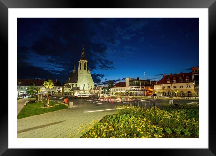 Limanowa, Poland : Panorama City center main square night view with a famous church and building cityscape a unit of local government powiat in Lesser Poland Voivodeship, southern Polish town Framed Mounted Print by Arpan Bhatia