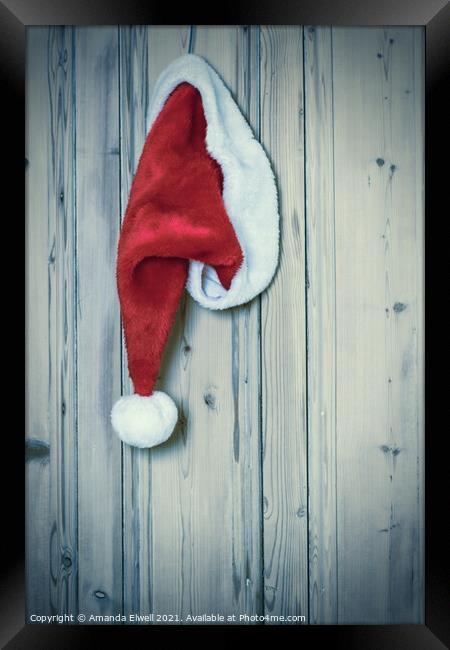 Santa Hat On Rustic Door Framed Print by Amanda Elwell