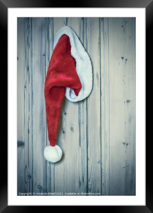 Santa Hat On Rustic Door Framed Mounted Print by Amanda Elwell