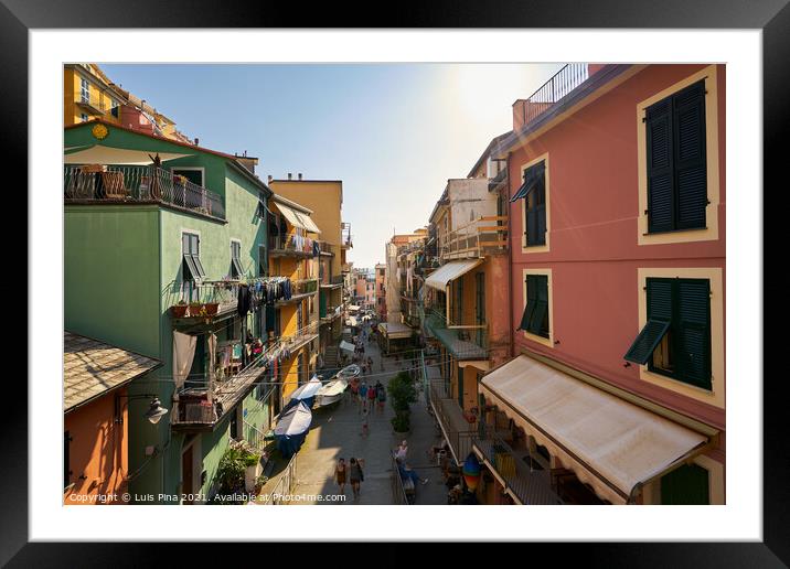 Colorful Manarola street full of tourists in Cinque Terre, Italy Framed Mounted Print by Luis Pina