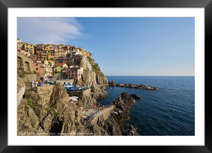 Manarola beach and city view in Cinque Terre, in Italy Framed Mounted Print by Luis Pina