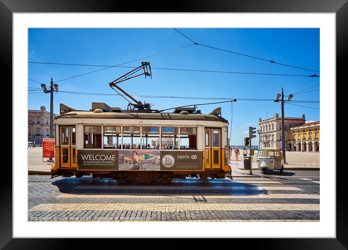 Lisbon Yellow Tram on a street in Terreiro do Paco, Portugal Framed Mounted Print by Luis Pina