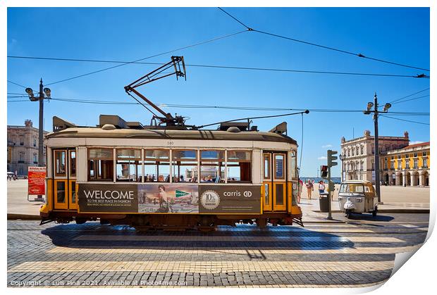 Lisbon Yellow Tram on a street in Terreiro do Paco, Portugal Print by Luis Pina