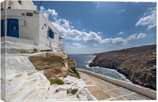 House overlooking the sparkling Mediterranean Sea in the hillside village of Kastro on Sifnos Island. Canvas Print by Chris North