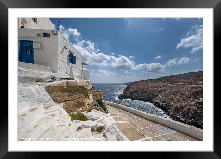 House overlooking the sparkling Mediterranean Sea in the hillside village of Kastro on Sifnos Island. Framed Mounted Print by Chris North
