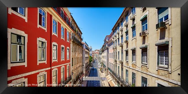 Colorful street Houses in Lisbon, Portugal Framed Print by Luis Pina