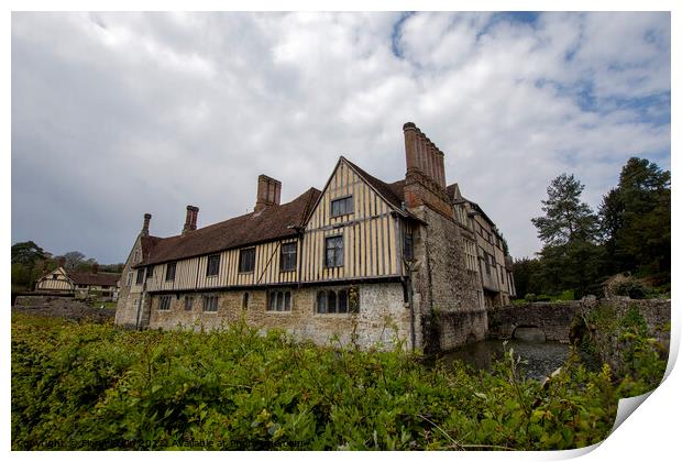 Ightham Mote under a cloudy sky  Print by Fiona Etkin