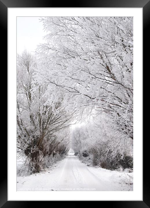 A tree covered in snow Framed Mounted Print by Philip Gough
