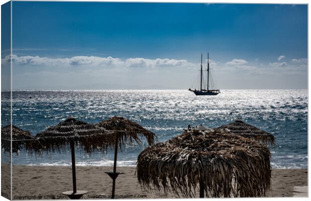 Yacht, at anchor off shore at Platis Gialos, Sifnos. Canvas Print by Chris North