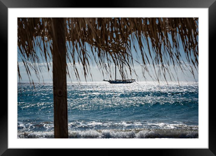 Yacht, at anchor of shore at Platis Gialos, Sifnos Framed Mounted Print by Chris North