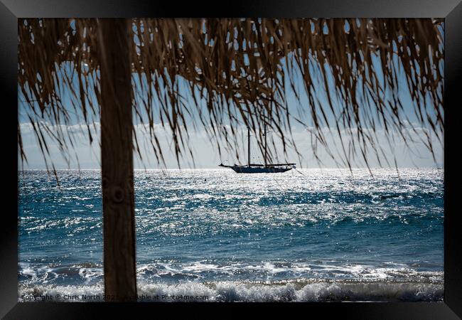 Yacht, at anchor of shore at Platis Gialos, Sifnos Framed Print by Chris North