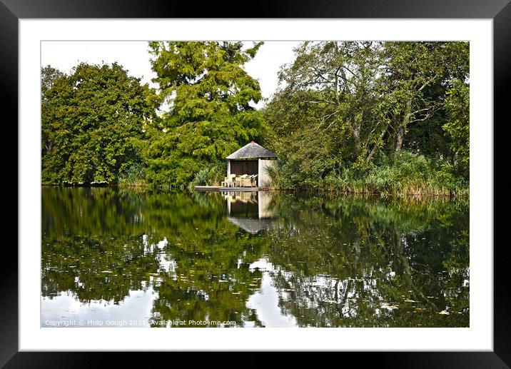 A cosy hut on the lake Framed Mounted Print by Philip Gough