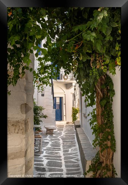 The back streets of old  Paros town. Framed Print by Chris North