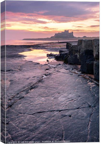 Bamburgh castle pastel sunrise Canvas Print by Lee Kershaw