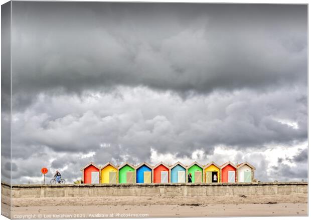 Stormy clouds over beach huts Canvas Print by Lee Kershaw