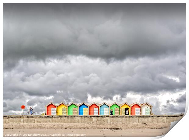 Stormy clouds over beach huts Print by Lee Kershaw