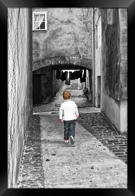 A child running through the old streets of Berwick upon Tweed Framed Print by Lee Kershaw