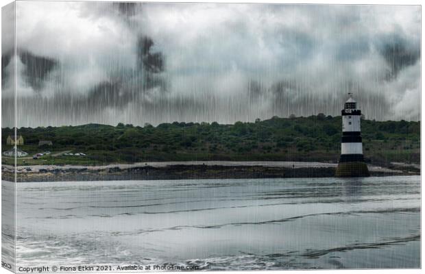 Penmon lighthouse Anglesey Canvas Print by Fiona Etkin