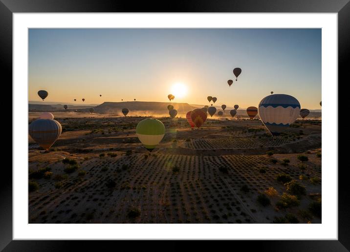 Hot Air balloons flying tour over Mountains landscape autumn sun Framed Mounted Print by Arpan Bhatia
