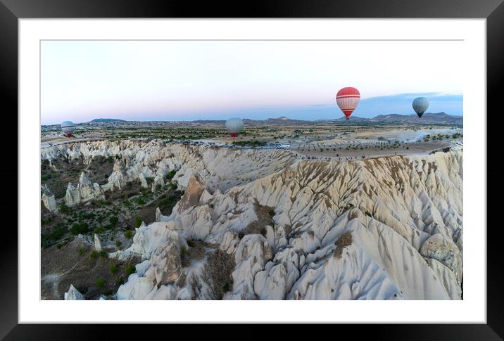 Wide angle view of hot air balloons against unique geological fo Framed Mounted Print by Arpan Bhatia