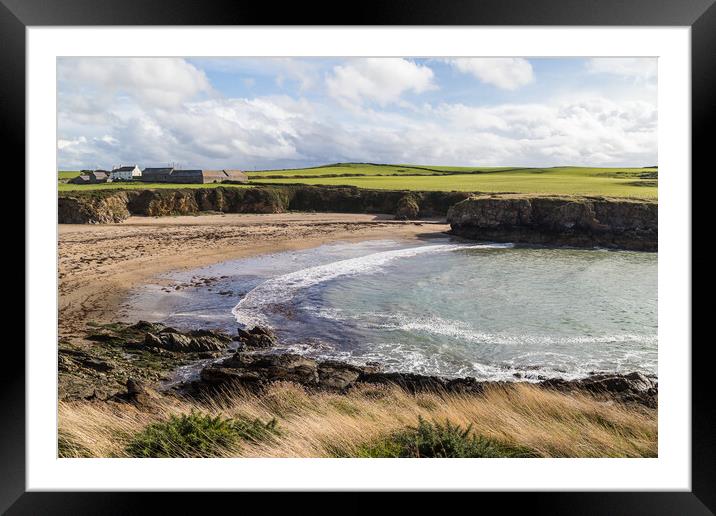 Waves lap up against Porth Nobla Framed Mounted Print by Jason Wells
