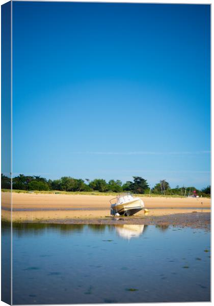 boat laying on the beach Canvas Print by youri Mahieu