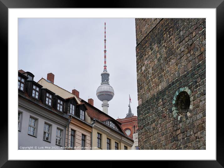 Berlin TV Tower on a cloudy day seen from Nikolaikirche Church Framed Mounted Print by Luis Pina