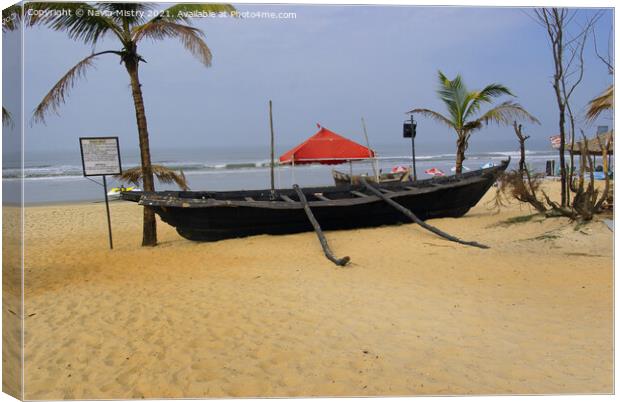 A local fishing boat, Benhaulim , South Goa, India Canvas Print by Navin Mistry