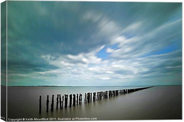 The Breakwater Canvas Print by Keith Mountford