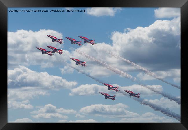 Red arrows in a cornish sky,smoke trails,   Framed Print by kathy white