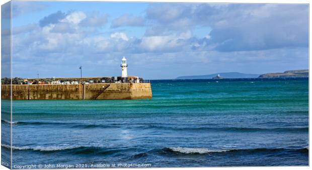 Going out of St Ives. Canvas Print by John Morgan