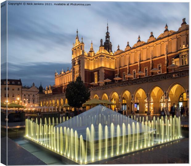 The Market Square in Krakow Poland in the Evening Canvas Print by Nick Jenkins