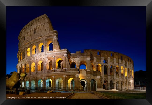 Coliseum in Rome at night Framed Print by Luis Pina