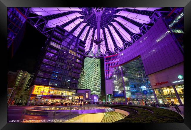 Sony Center in Berlin at night with purple lights on the ceiling Framed Print by Luis Pina