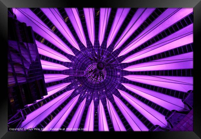 Sony Center in Berlin at night with purple lights on the ceiling Framed Print by Luis Pina