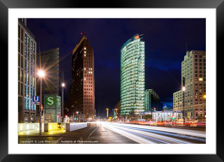 Potsdamerplatz plaza in Berlin at night with light trails Framed Mounted Print by Luis Pina