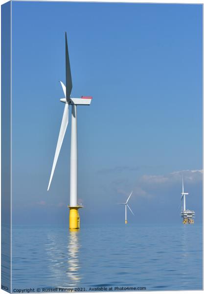 Wind farm of east coast of England Canvas Print by Russell Finney