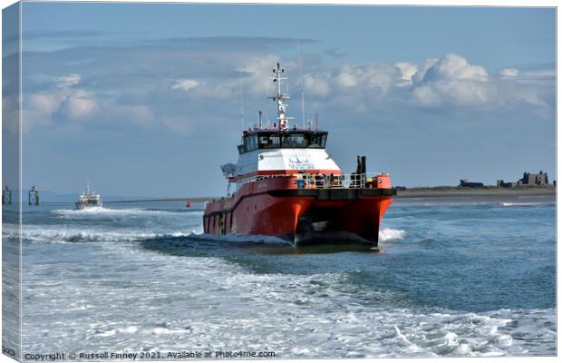 Offshore windfarm supply vessels Canvas Print by Russell Finney