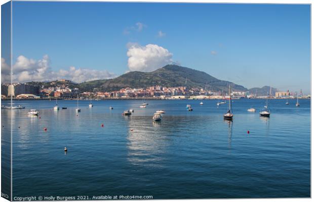 Getxo, small town of the bay of Biscay, clam waters as the clouds are arising over the mountains,  Canvas Print by Holly Burgess