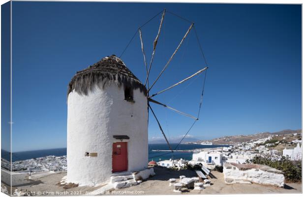 Boni's Windmill overlooking Mykonos port. Canvas Print by Chris North