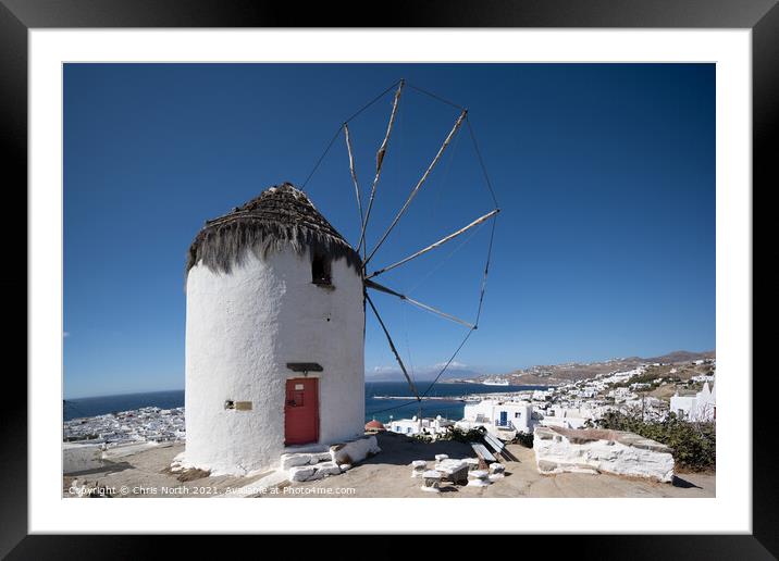 Boni's Windmill overlooking Mykonos port. Framed Mounted Print by Chris North