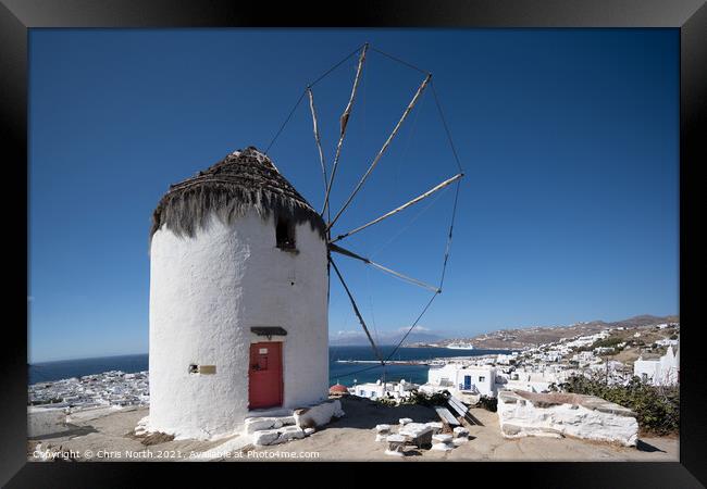 Boni's Windmill overlooking Mykonos port. Framed Print by Chris North