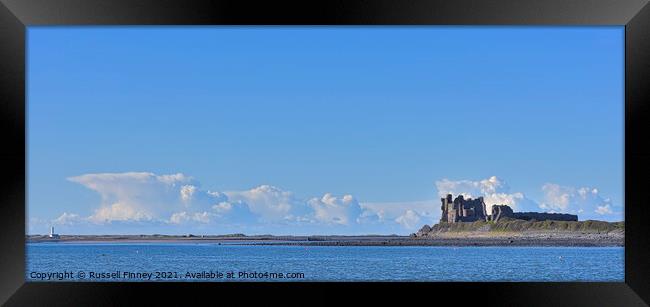 Barrow-in-Furness and the Piel Channel Castle and light house Framed Print by Russell Finney