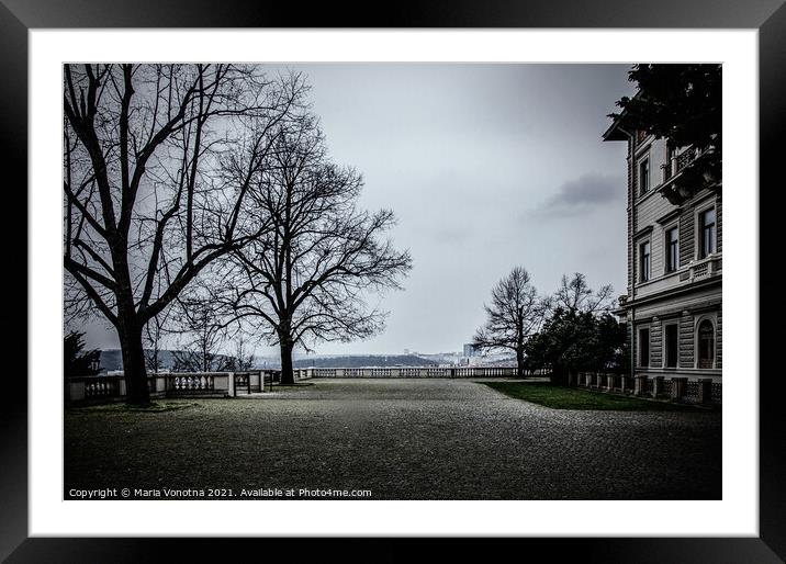 Park near palace on dark grey autumn day in Prague Framed Mounted Print by Maria Vonotna